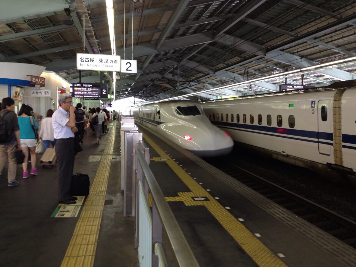 A Sanyo Shinkansen train leaving the platform
